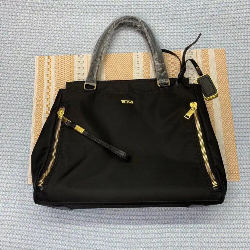 Tumi Black Tote Bag with Gold Accents